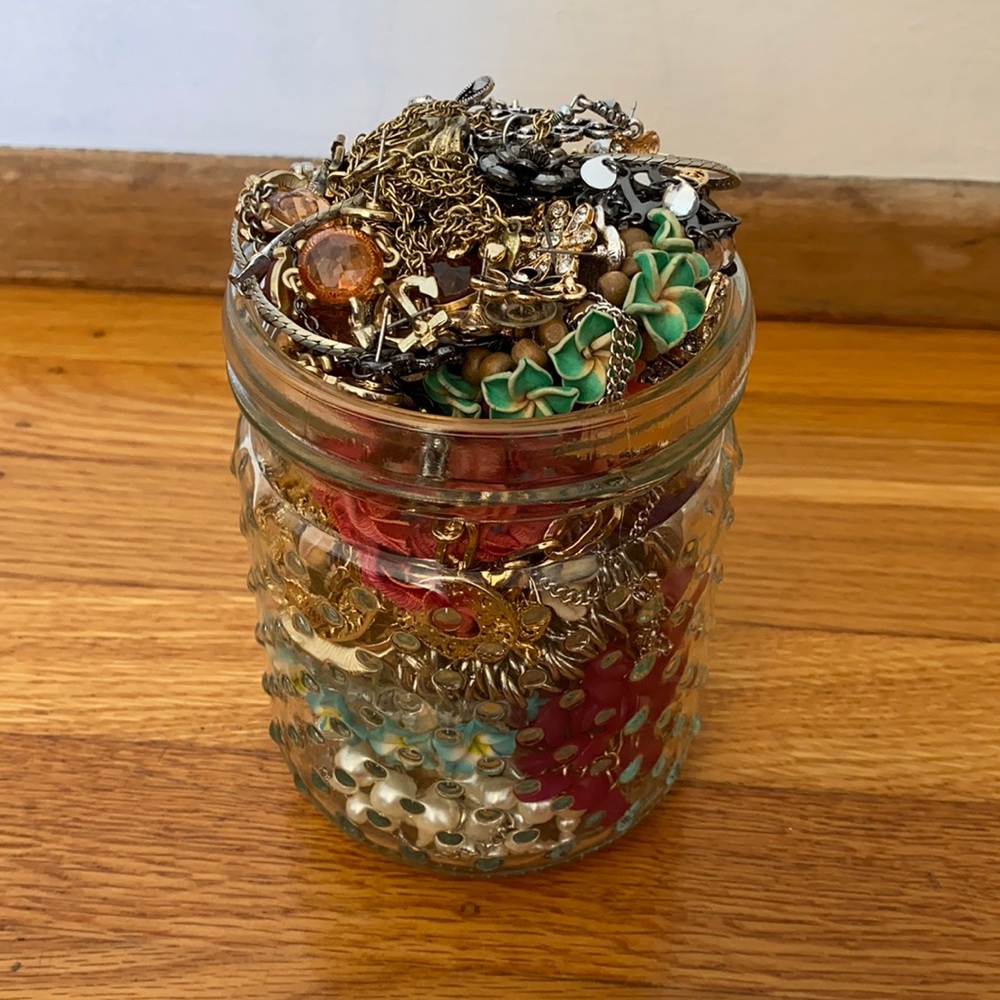 Jar full of jewelry